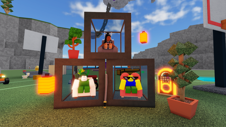 Stacked furniture rooms built on the Fling Things and People grass